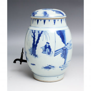 A transitional blue blue and white covered jar as a drinks dispenser