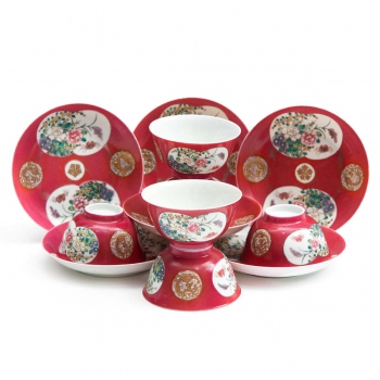 Six cups and saucers ruby ground famille rose
