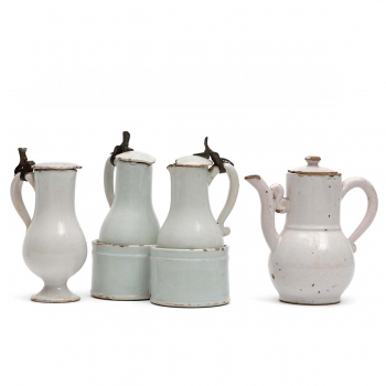 A white Delft cruet, a small jug and coffee pot