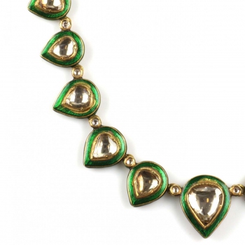 An Indian 18k gold enamel and diamond necklace and matching earrings