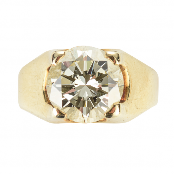 A 14k gold diamond single stone ring